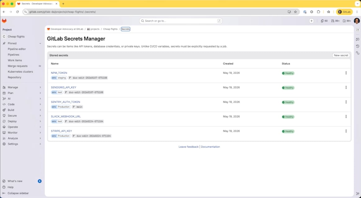 GitLab Secrets Manager interface listing project secrets and their status