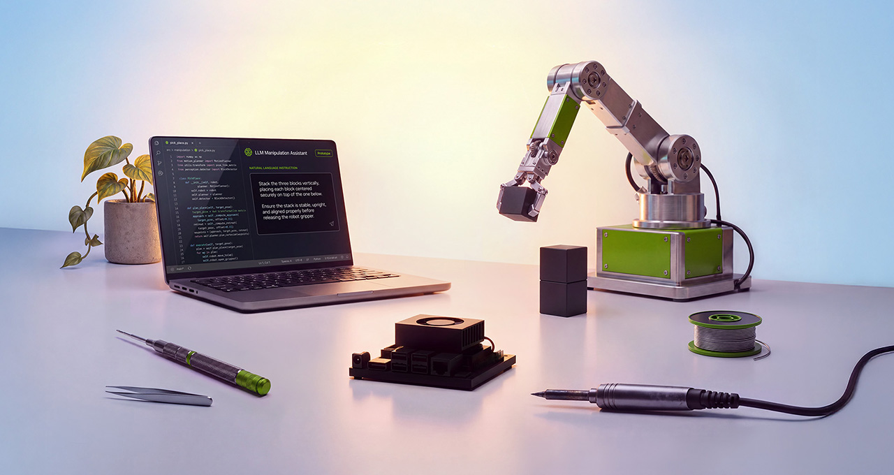 NVIDIA Jetson Orin Nano 2 module on a workbench beside a laptop and robotic arm